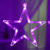 Purple LED star-shaped light against a dark background